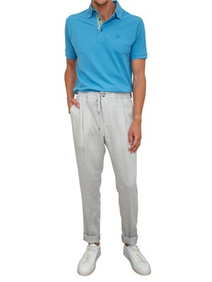 Polo azzurra Etro in cotone con dettaglio stampa floreale sul collo in UOMO